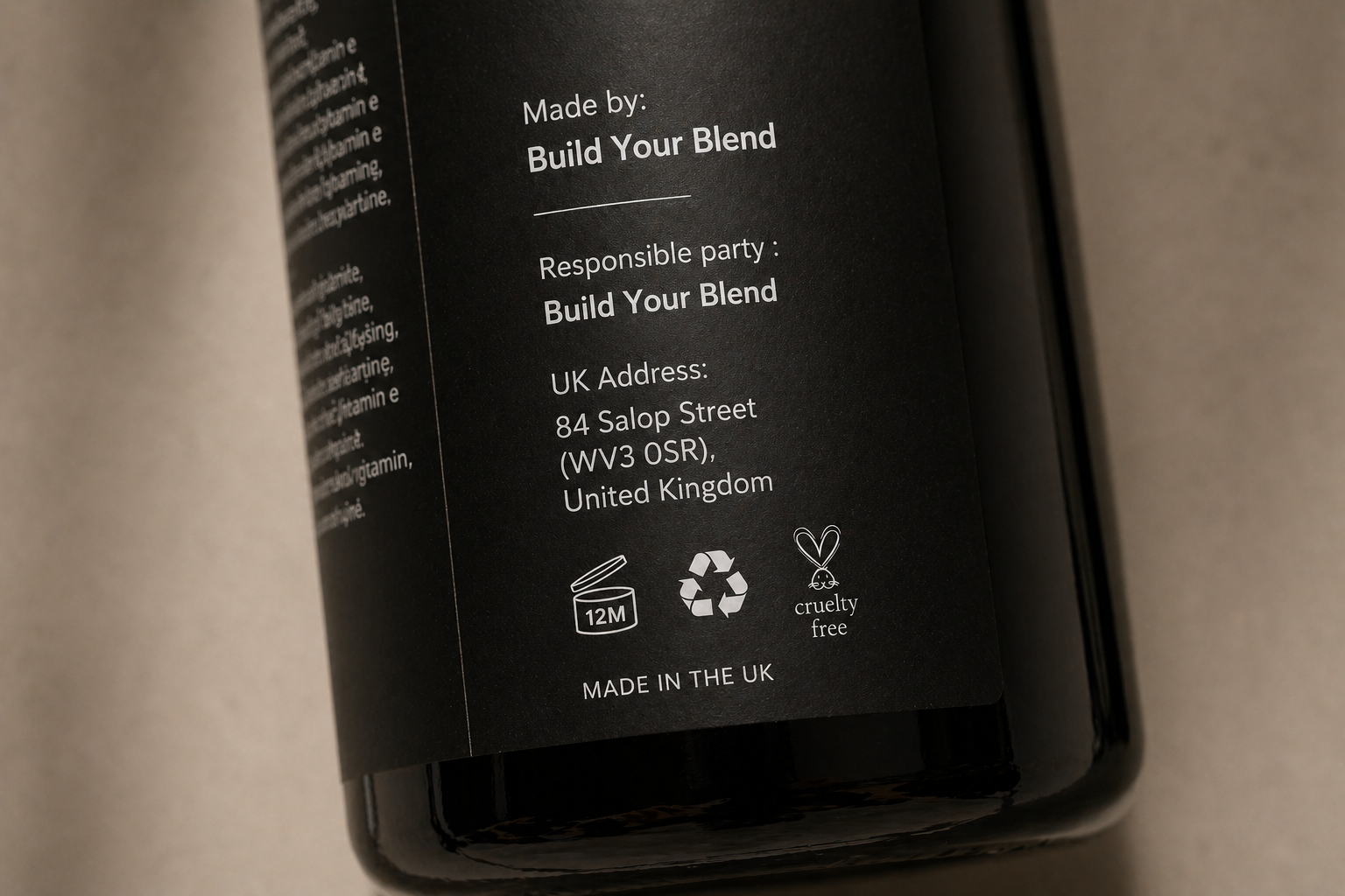 Close-up of a professionally designed product label showing brand name, fragrance name, and compliance details